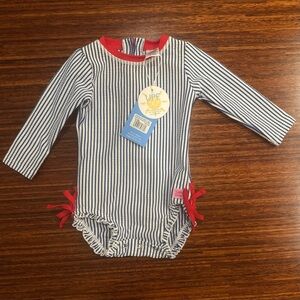 RuffleButts Seersucker Long Sleeve One Piece Rash Guard blue/white/red 12/18 m